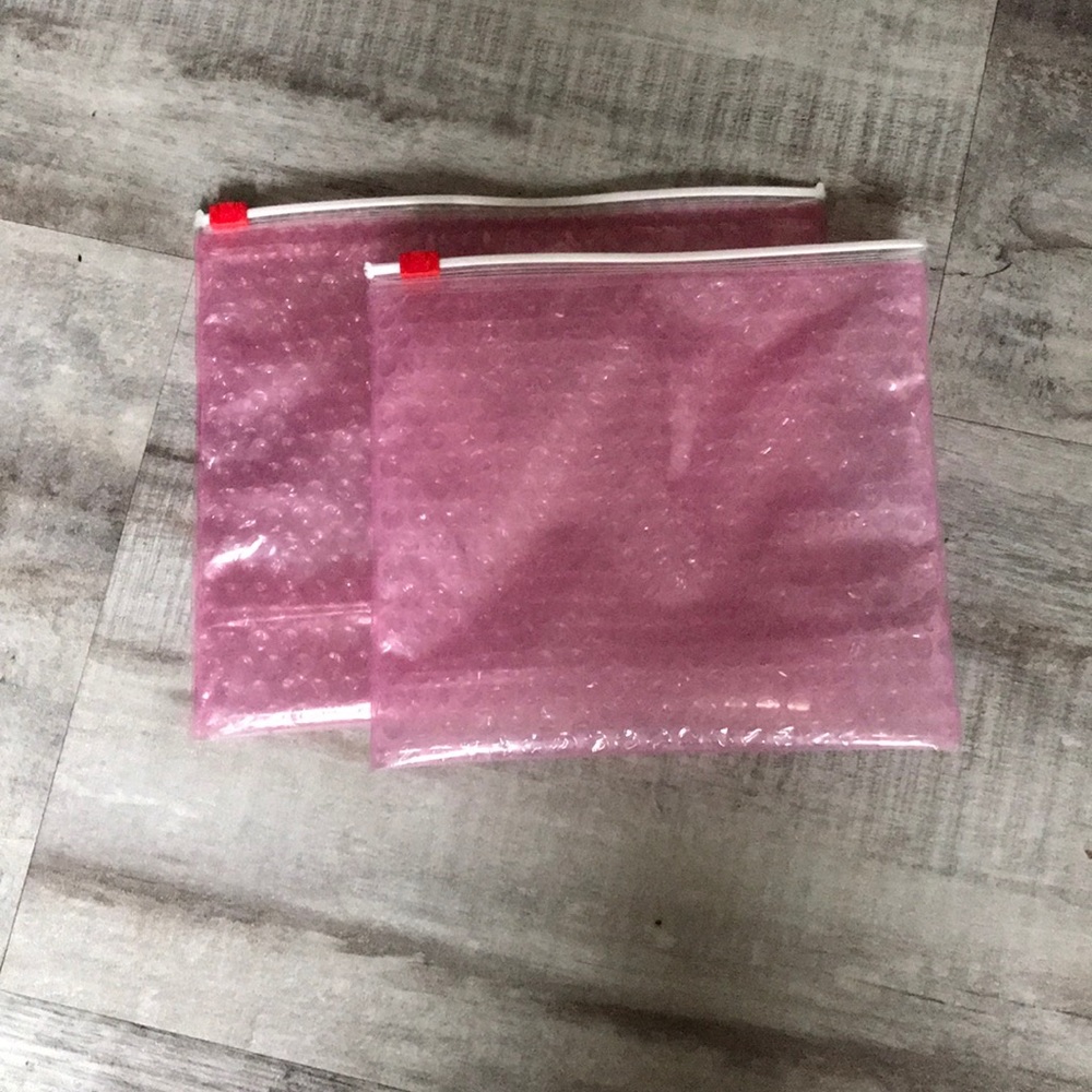 2 Glossier pouches